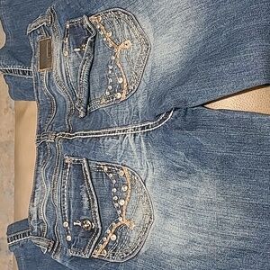 Womans Petrol bling jeans size 32 in EUC.